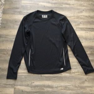 New Balance Shirt never worn. Made with really nice material. Fast drying.